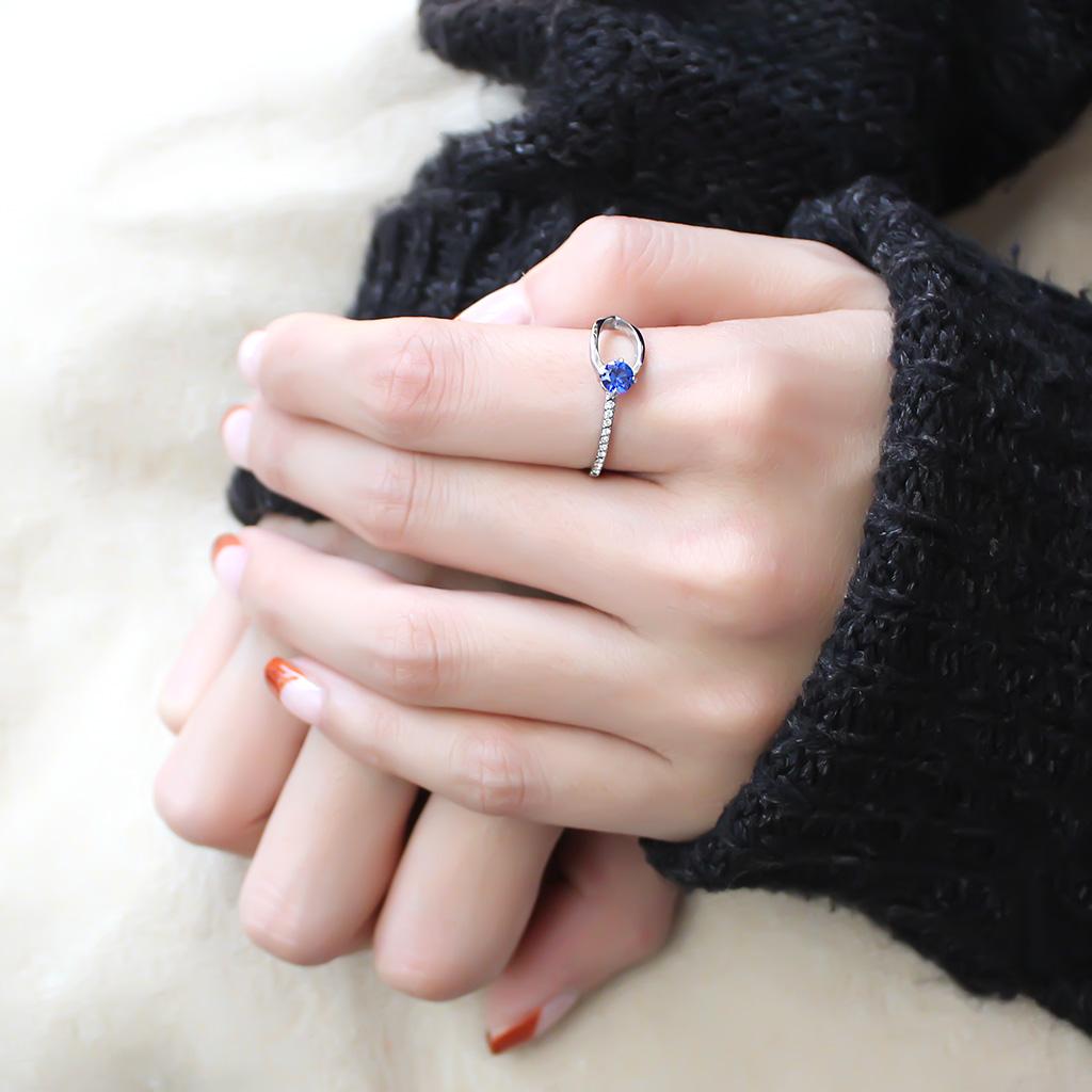 MADA121 - High polished (no plating) Stainless Steel Ring with AAA Grade CZ in London Blue