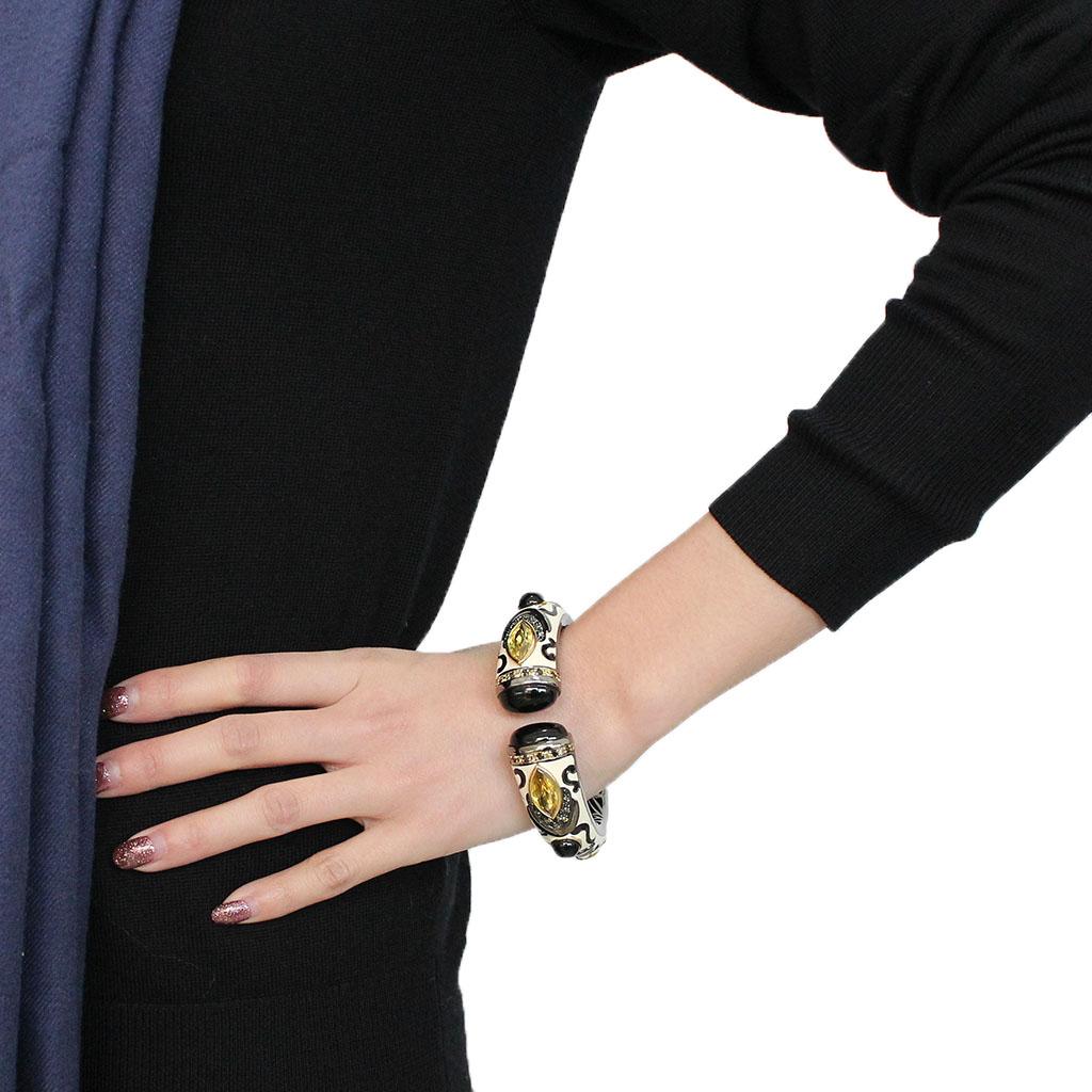 MALO4298 - Gold+Hematite Brass Bangle with Synthetic Onyx in Jet