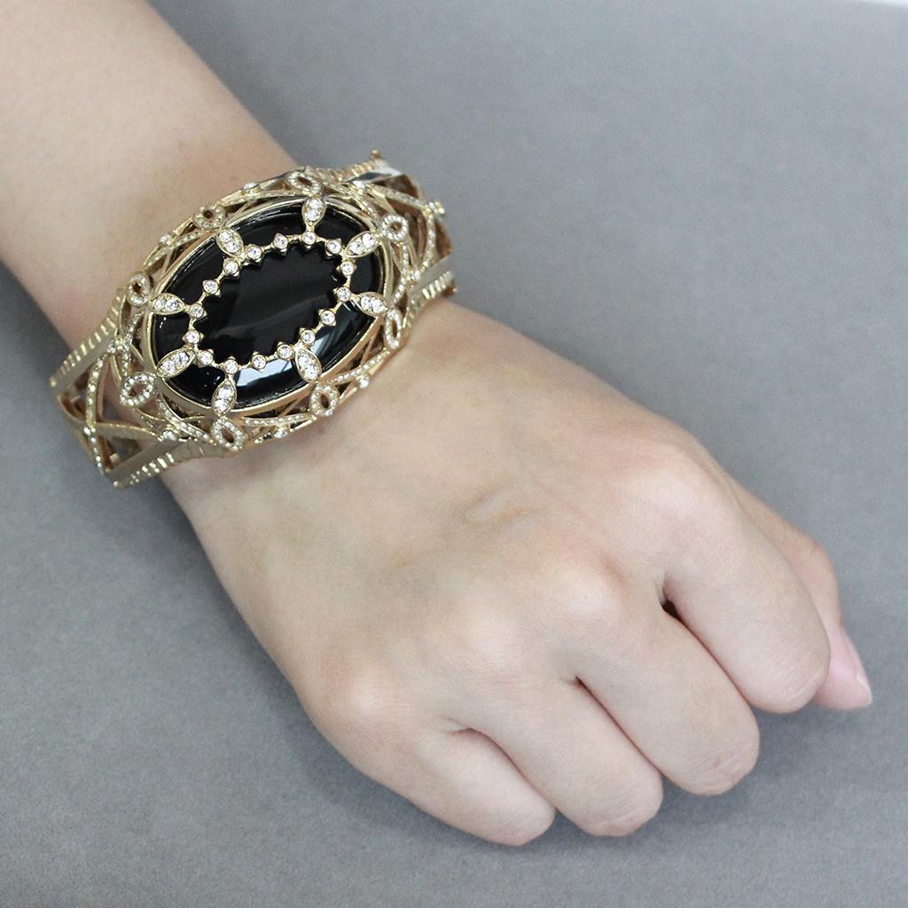 MALO4349 - Gold Brass Bangle with Synthetic in Jet