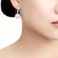 MA3W1479 - Rhodium Brass Earrings with Synthetic Pearl in White