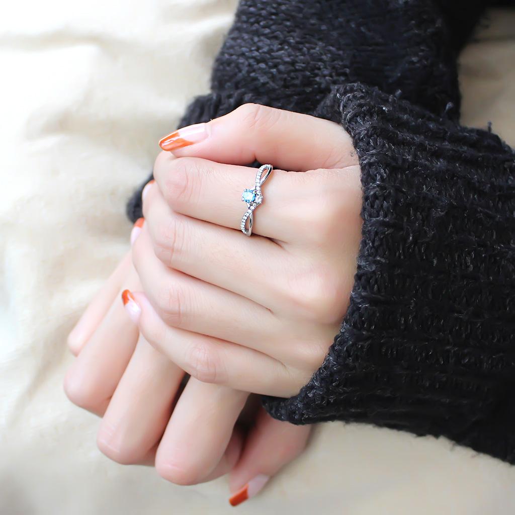 MADA120 - High polished (no plating) Stainless Steel Ring with AAA Grade CZ  in Sea Blue