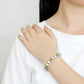 MALO4653 - Antique Silver White Metal Bracelet with Synthetic Pearl in Olivine color
