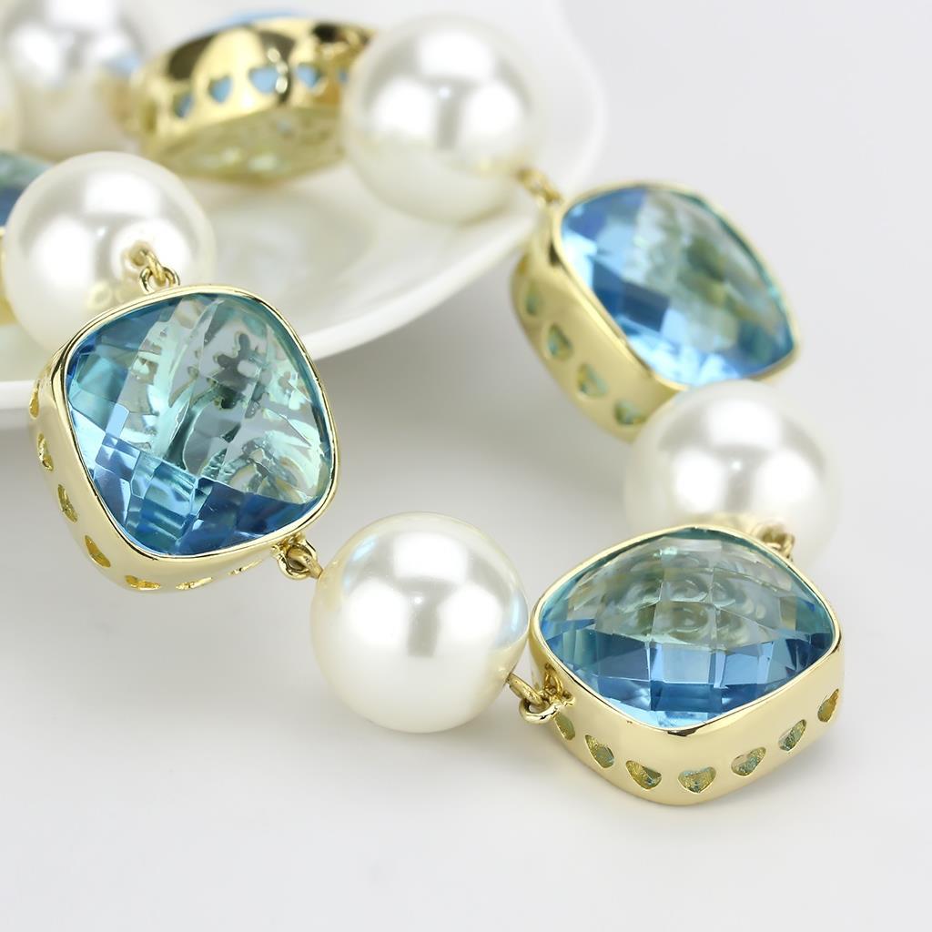 MALO4706 - Gold Brass Necklace with Synthetic Synthetic Glass in Sea Blue