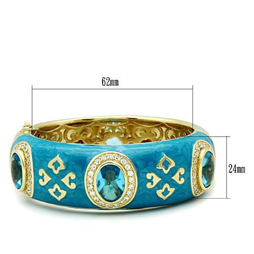 MALO2250 - Gold Brass Bangle with Synthetic Synthetic Glass in Sea Blue